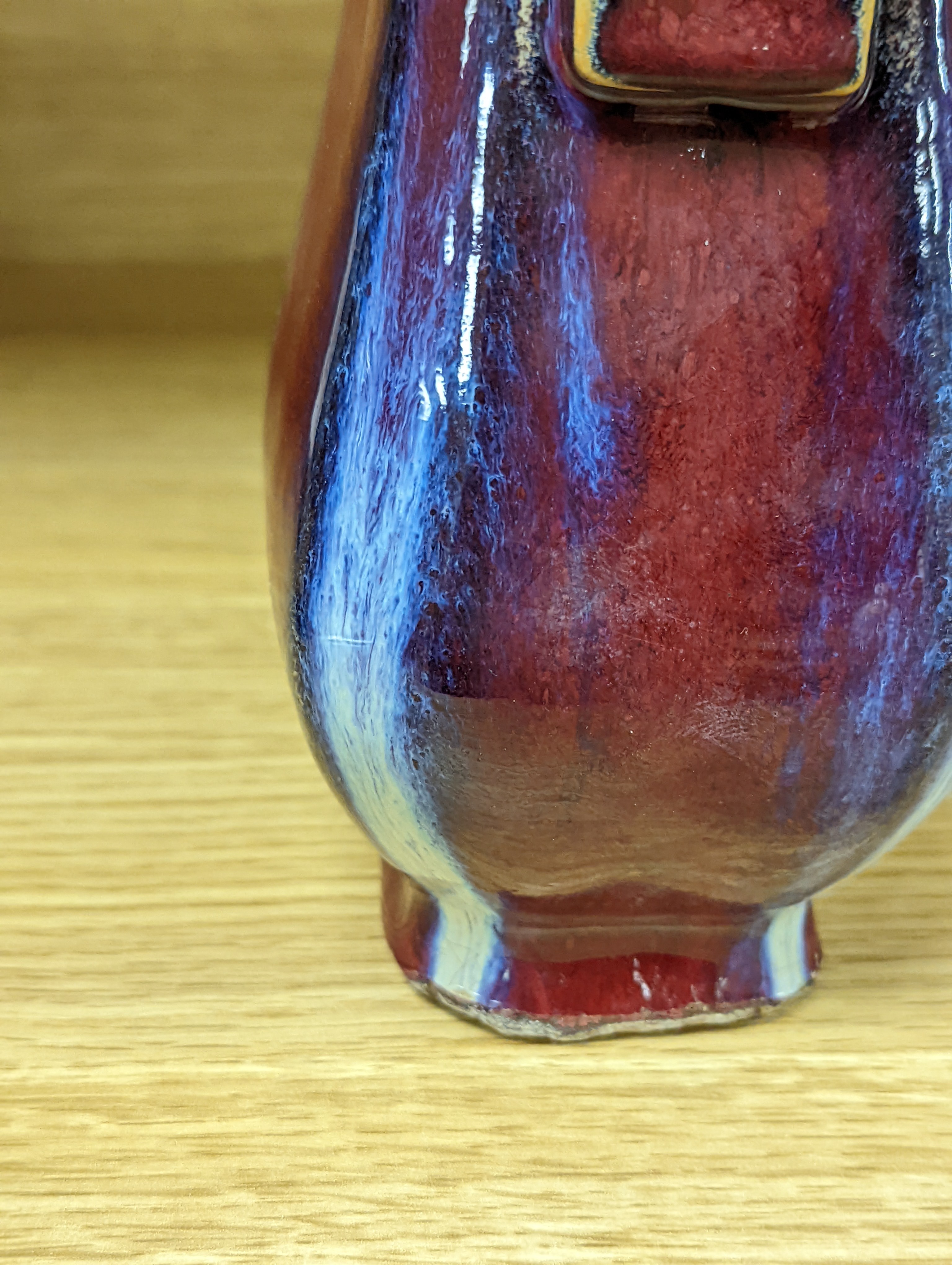 A Chinese sang de boeuf arrow vase 17cm